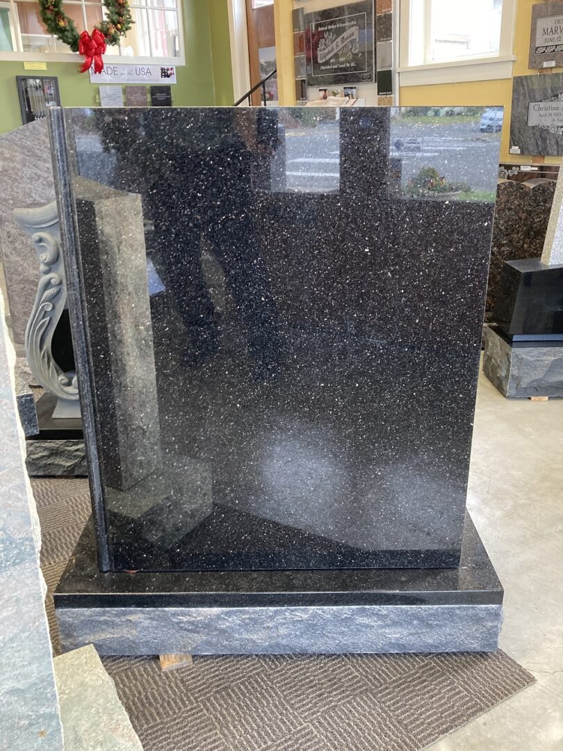 A huge black blank tombstone