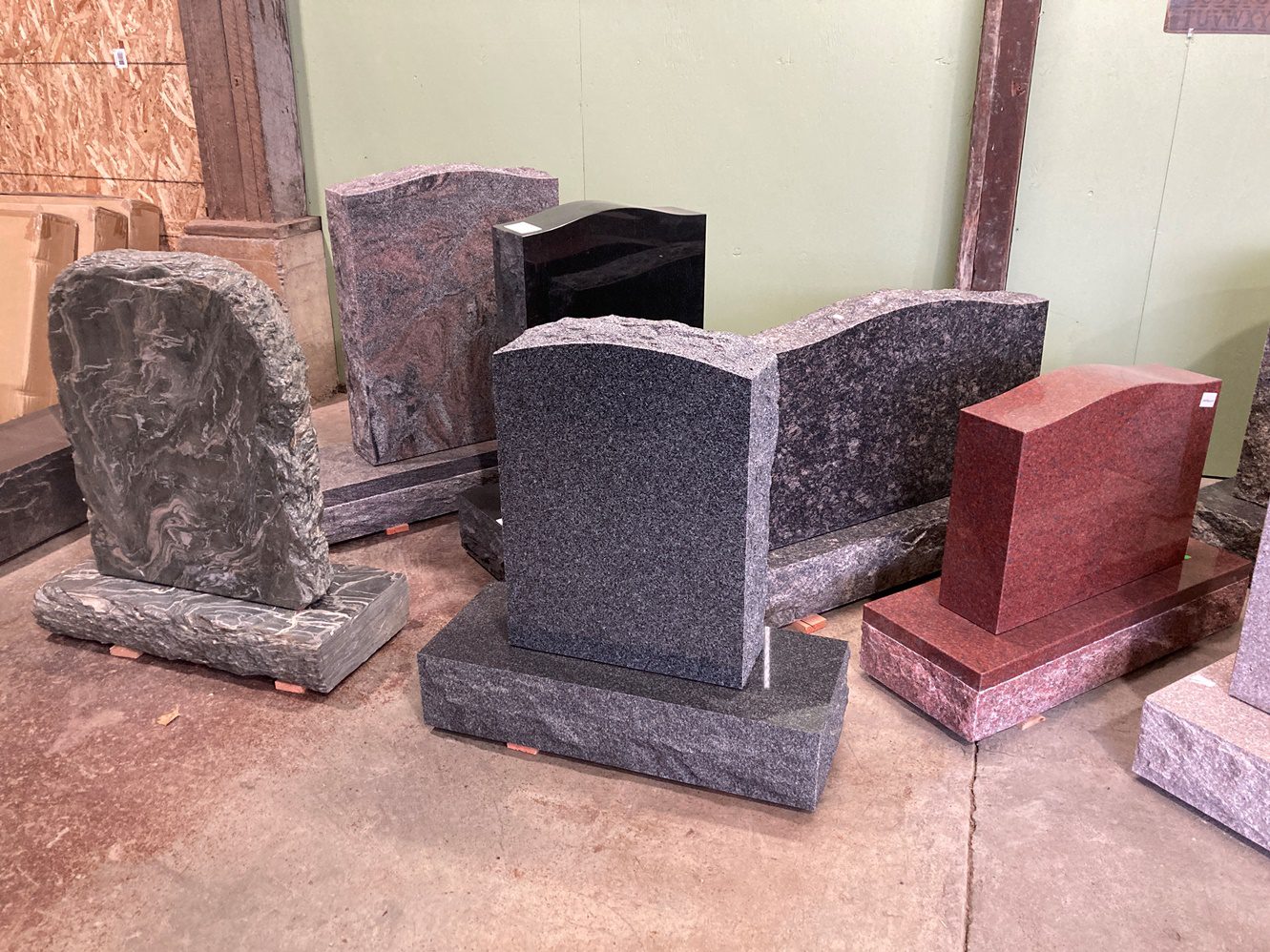 Six granite tombstones with different colors